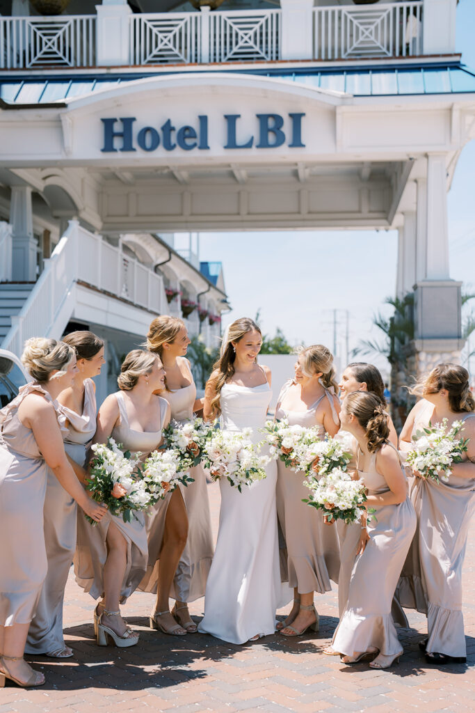 Bride and bridesmaids outside of Hotel LBI on wedding day