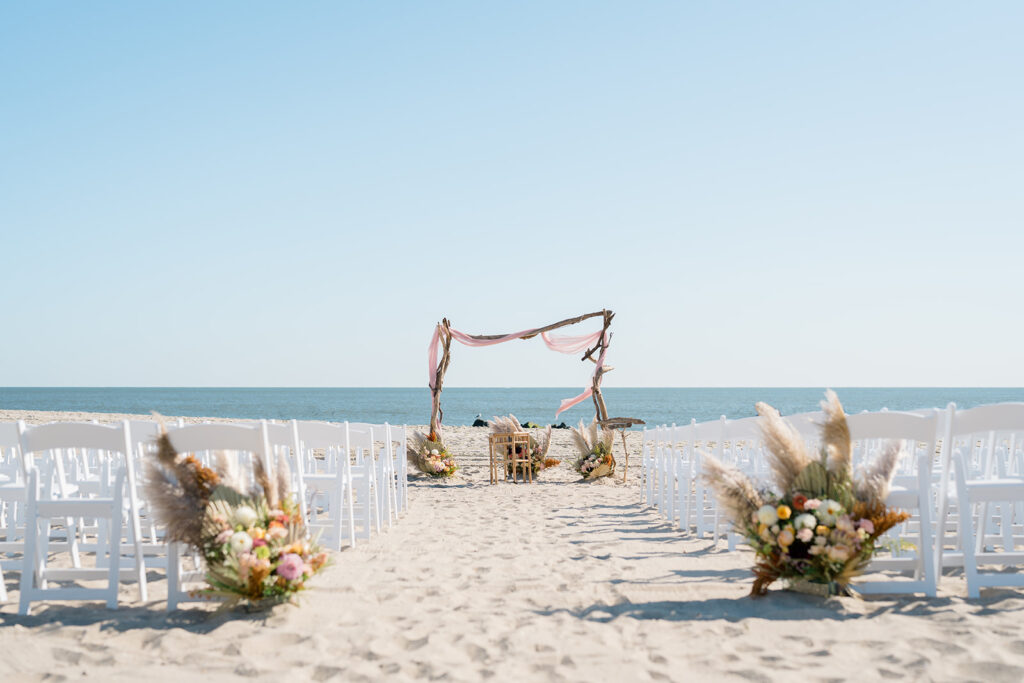 Ultimate Guide to Beach Weddings in Cape May - ceremony decor at the Cape May Convention Hall