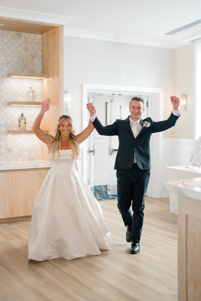 Bride and groom sharing their first dance at their Icona Diamond Beach wedding reception